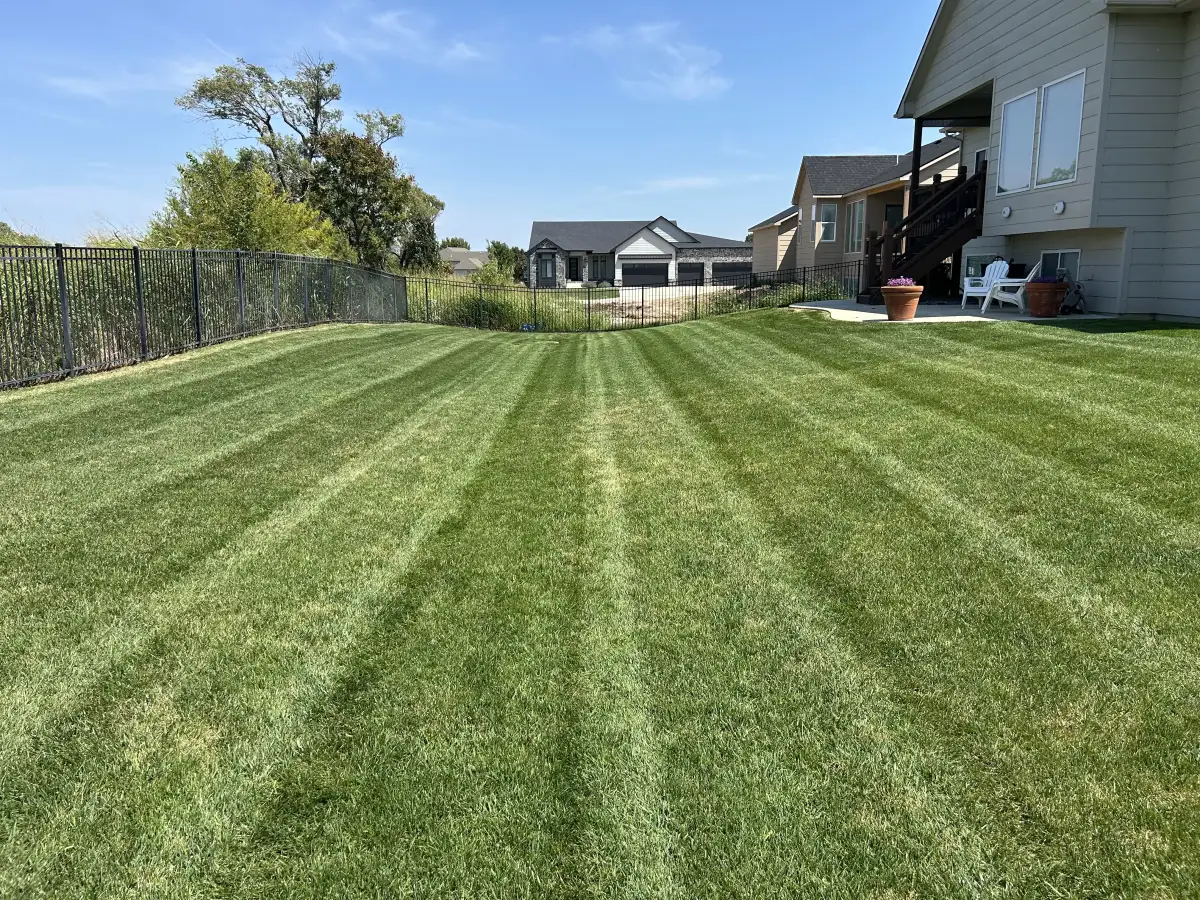 Clean-cut lawn with mowing stripes in Wichita Kansas